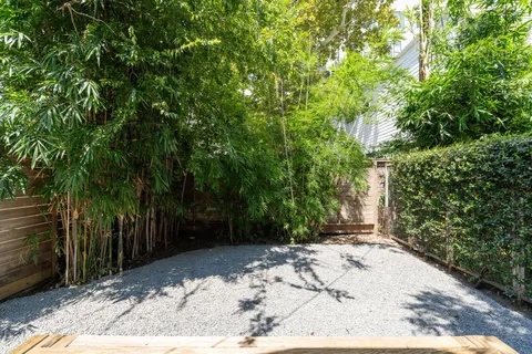 a backyard of a house with lots of green space
