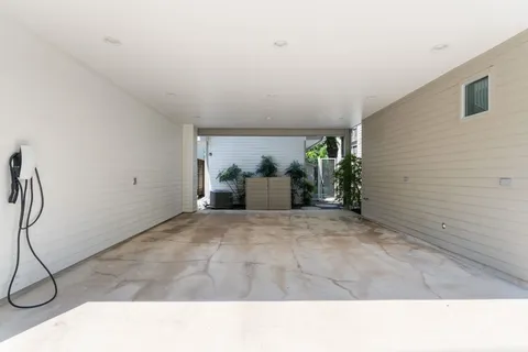 a black and white photo of a living room
