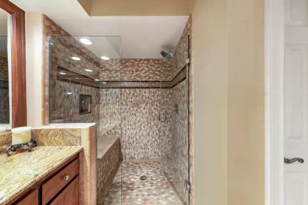 a outdoor living space with furniture and a fireplace