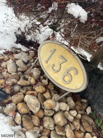 a view of a swimming pool with a yard