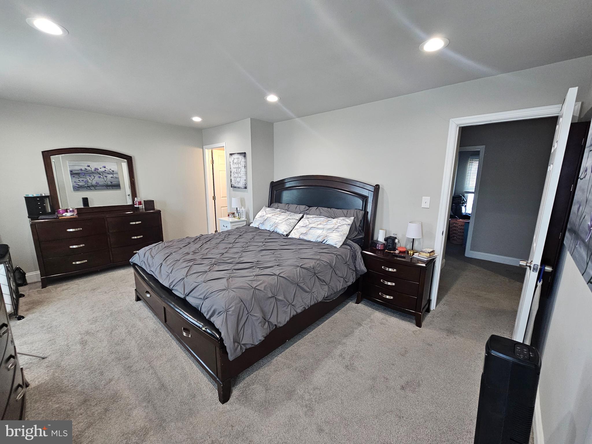 3108 Sounding Drive Edgewood, MD 21040 - Photo 15 of 37 Spacious bedroom with modern elegance.