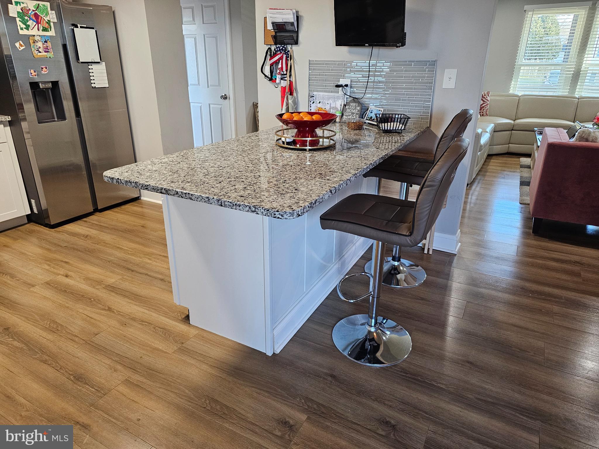 3108 Sounding Drive Edgewood, MD 21040 - Photo 8 of 37 Modern kitchen with sleek island seating.