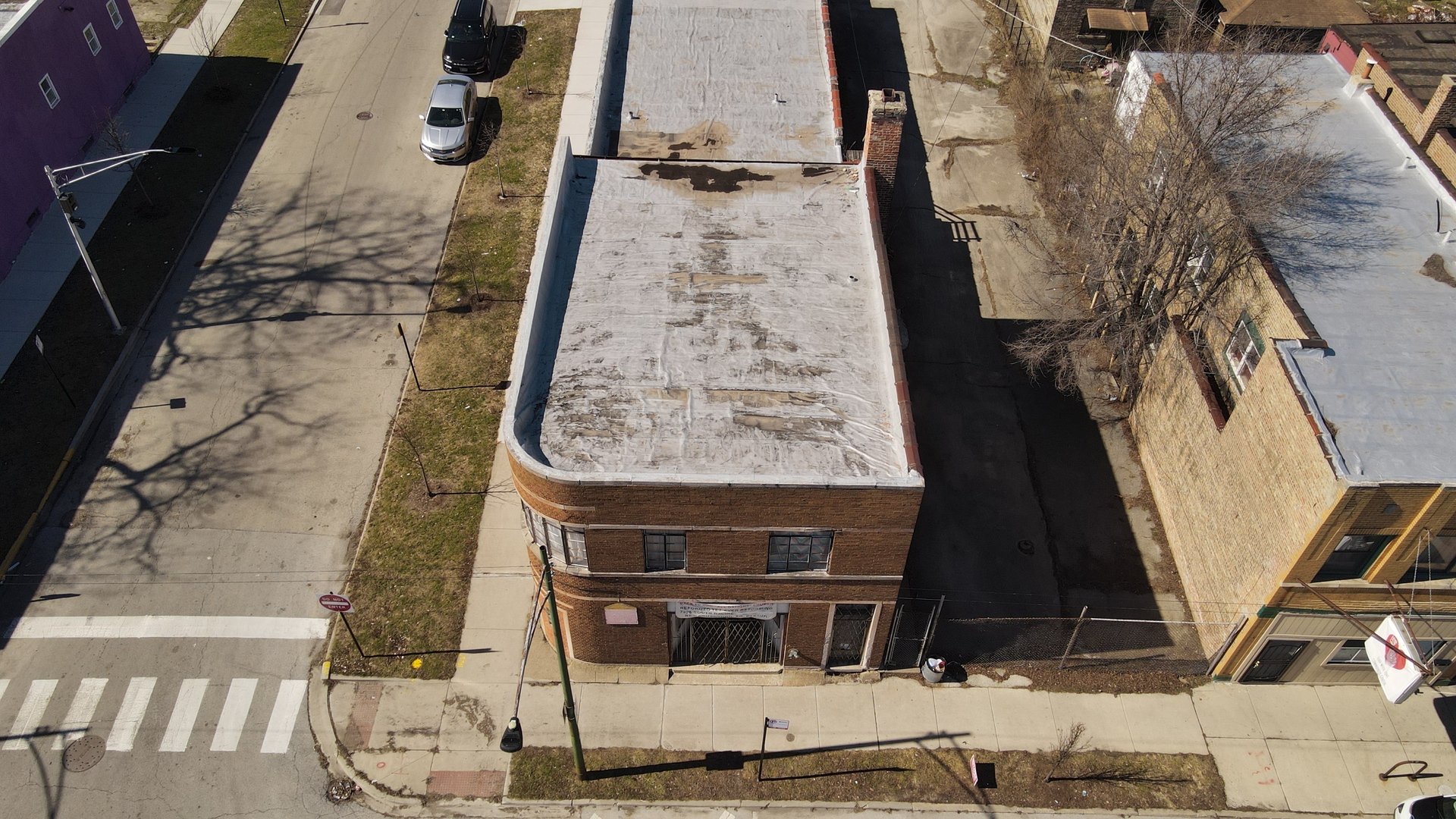 7326 South Racine Avenue Chicago, IL 60636 - Photo 3 of 4 an aerial view of residential houses with outdoor space