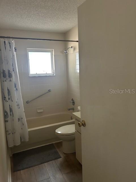 9748 Southwest 97th Street Ocala, FL 34481 - Photo 14 of 16 a bathroom with a toilet and a shower