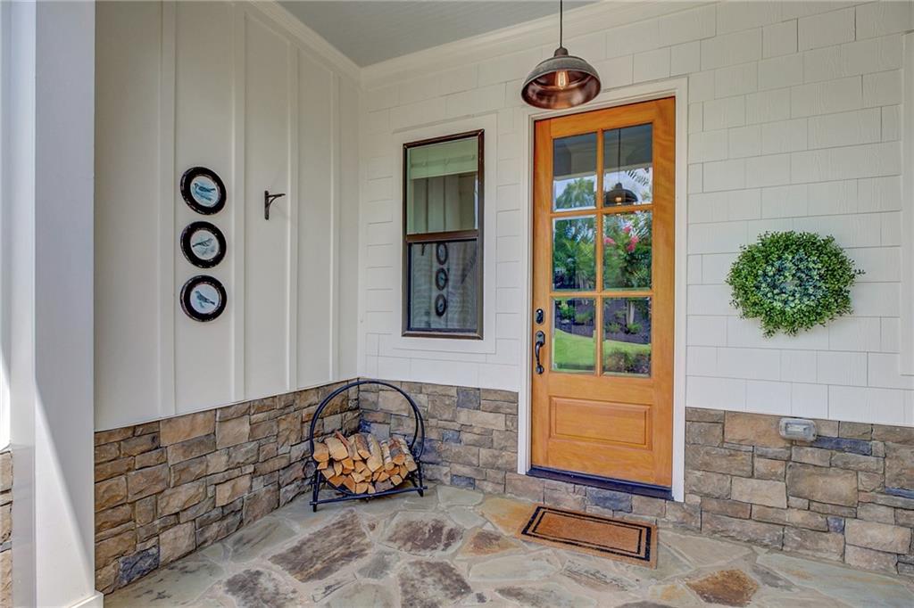 25 Paragon Point Newnan, GA 30265 - Photo 115 of 127 a front view of a house with a yard