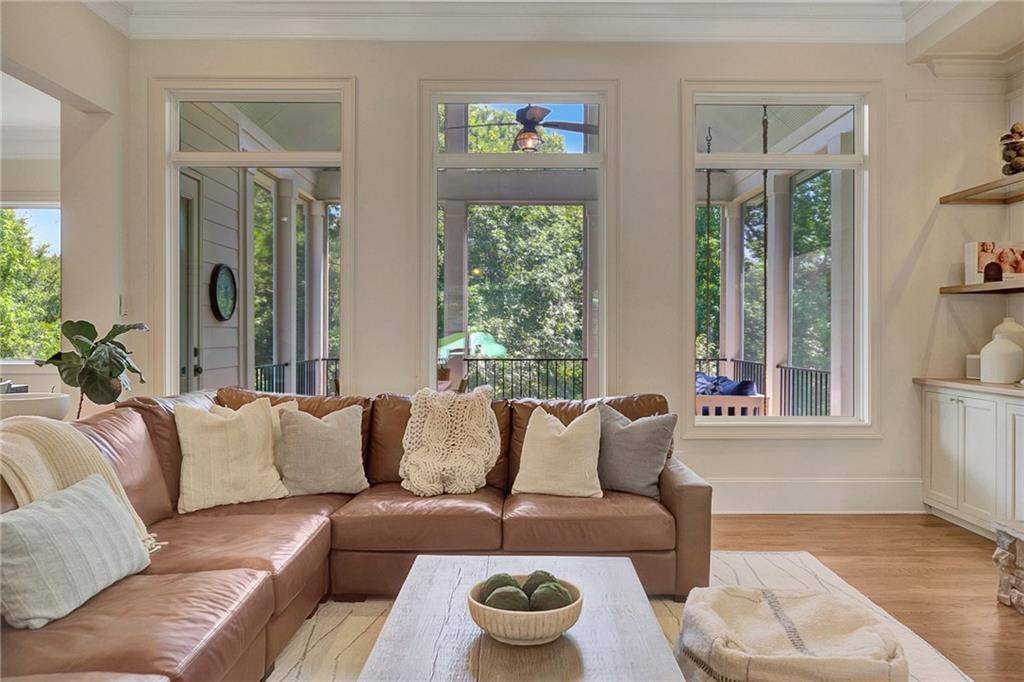25 Paragon Point Newnan, GA 30265 - Photo 16 of 127 a living room with furniture and a large window
