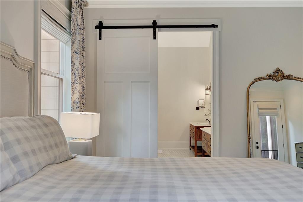 25 Paragon Point Newnan, GA 30265 - Photo 23 of 127 a bedroom with a bed and a window