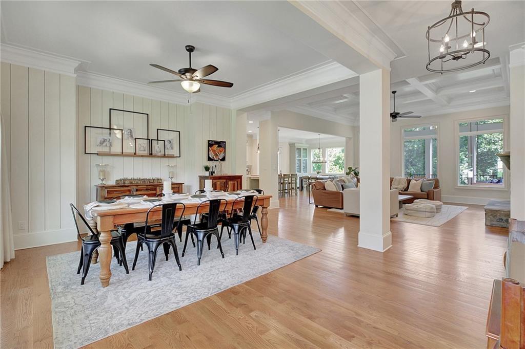 25 Paragon Point Newnan, GA 30265 - Photo 4 of 127 a view of a dining room with furniture and wooden floor