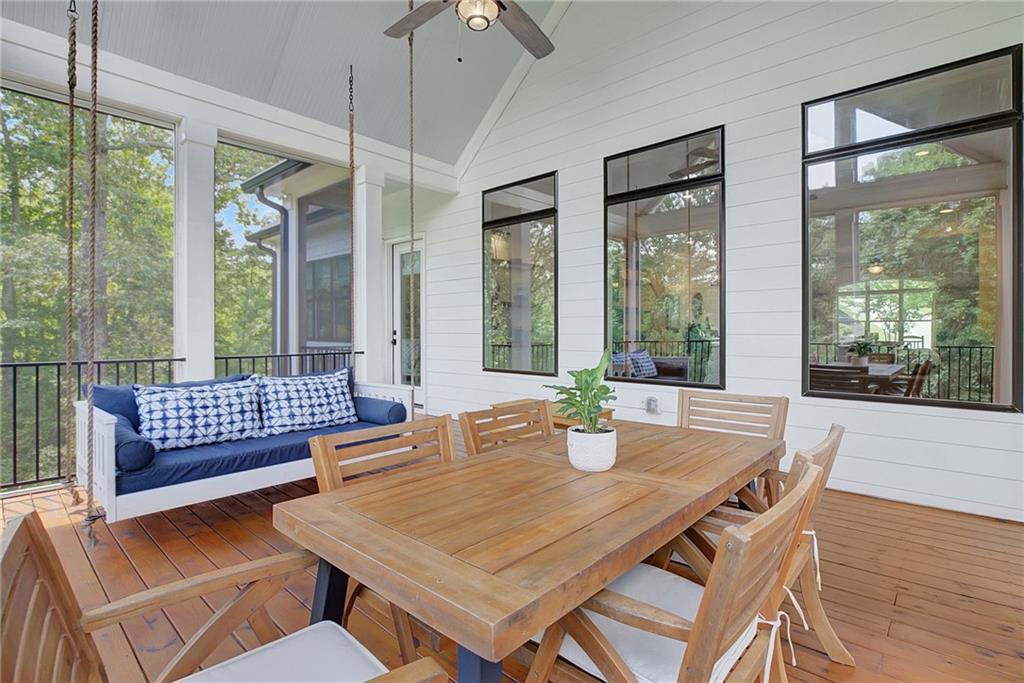 25 Paragon Point Newnan, GA 30265 - Photo 50 of 127 a view of a dining room and livingroom with furniture wooden floor a chandelier
