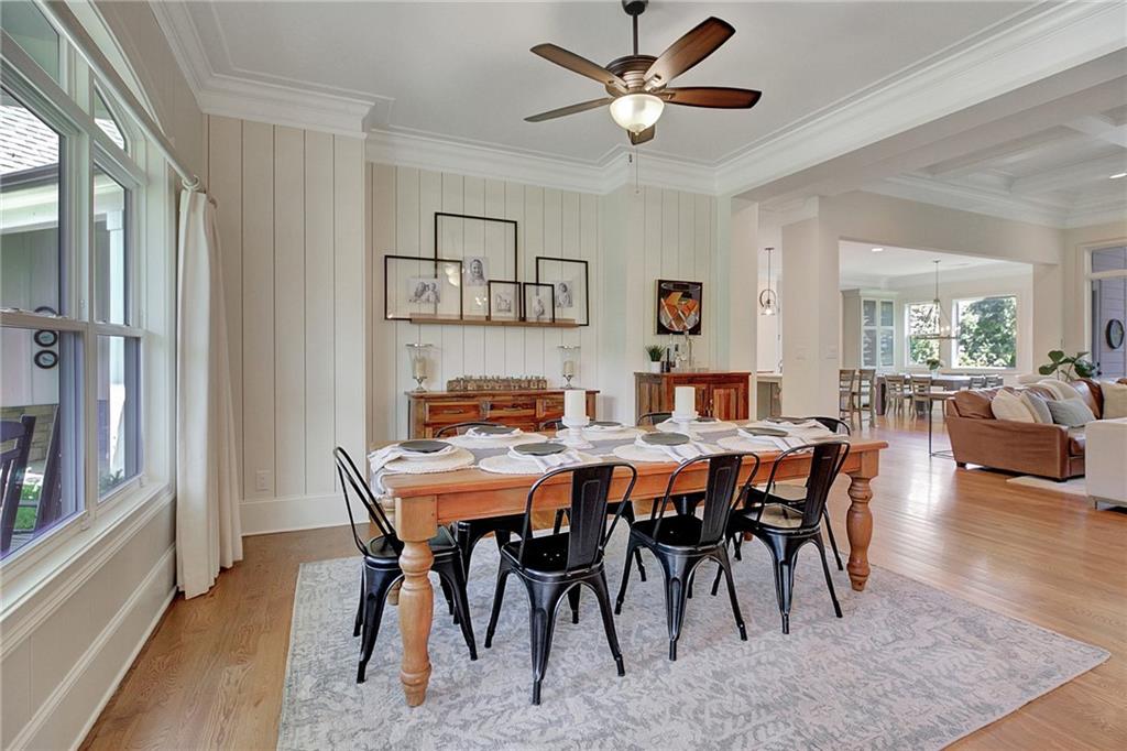 25 Paragon Point Newnan, GA 30265 - Photo 5 of 127 a view of a dining room with furniture and a livingroom