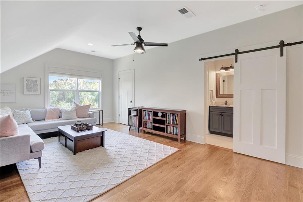 25 Paragon Point Newnan, GA 30265 - Photo 63 of 127 a living room with furniture and a window