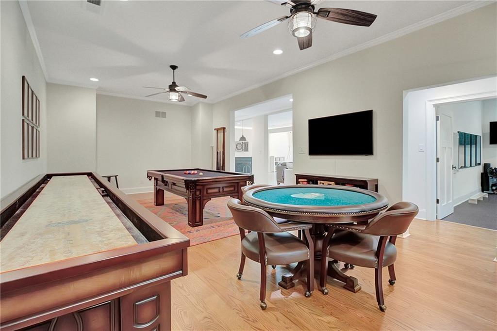 25 Paragon Point Newnan, GA 30265 - Photo 93 of 127 a view of a dining room with furniture and a chandelier