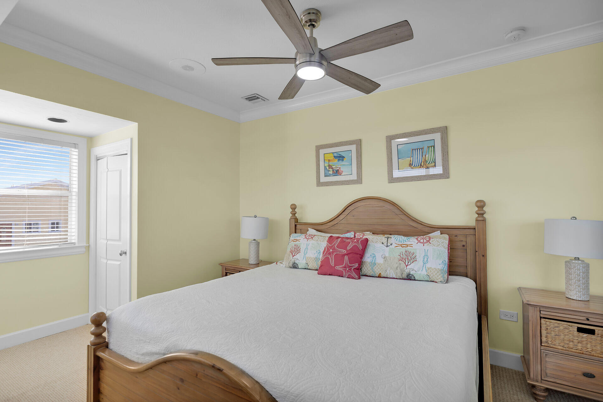 580-590 10th Street Key Colony Beach, FL 33051 - Photo 27 of 75 a bedroom with a bed and a chandelier