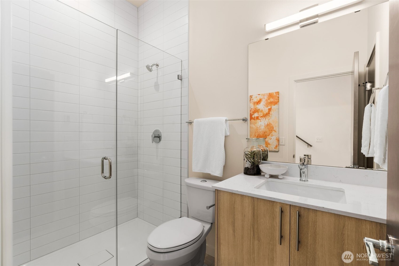 4853 South Findlay Street Seattle, WA 98118 - Photo 11 of 32 a bathroom with a sink a toilet and shower