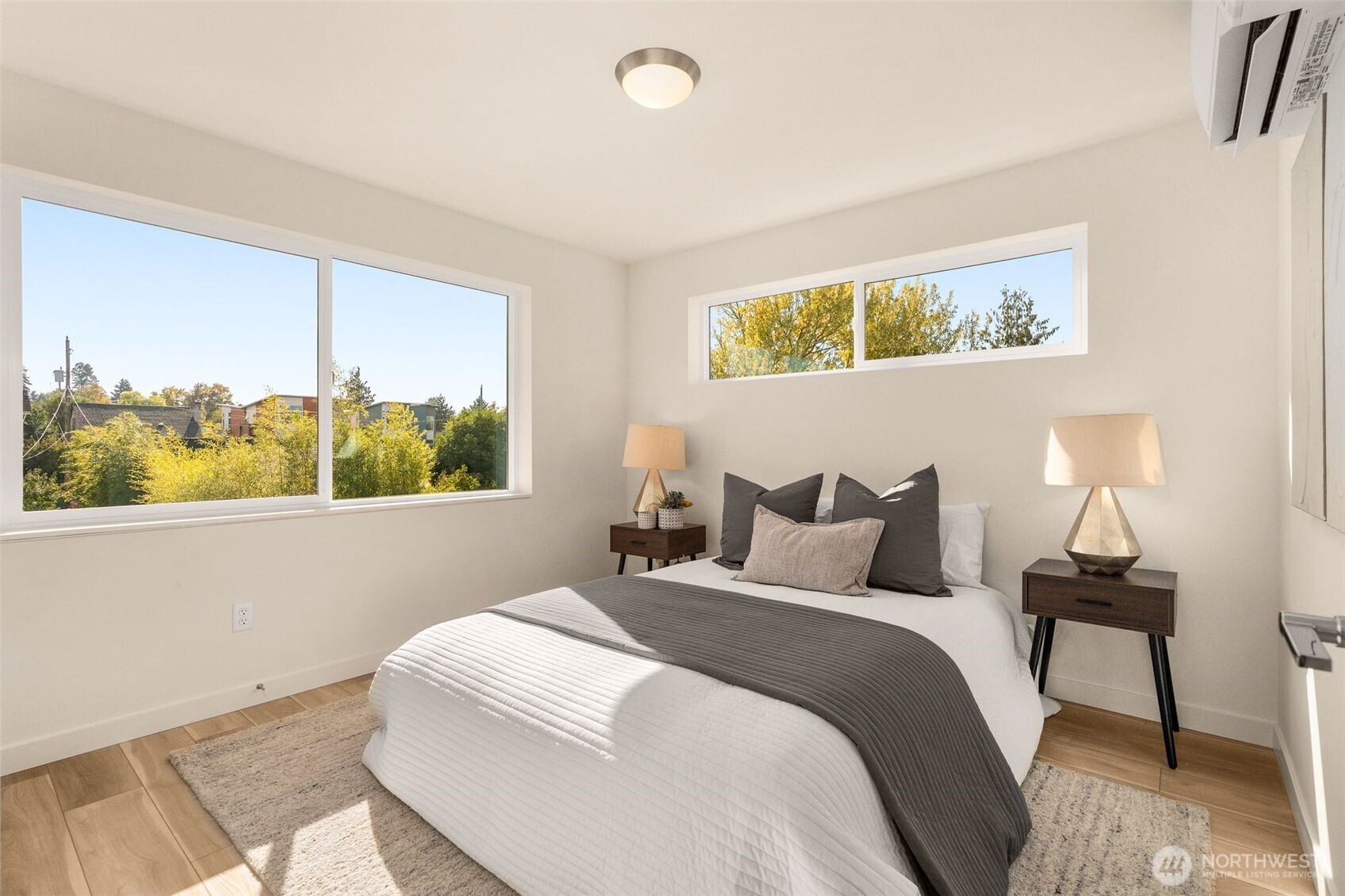 4853 South Findlay Street Seattle, WA 98118 - Photo 21 of 32 a bedroom with a bed and a window