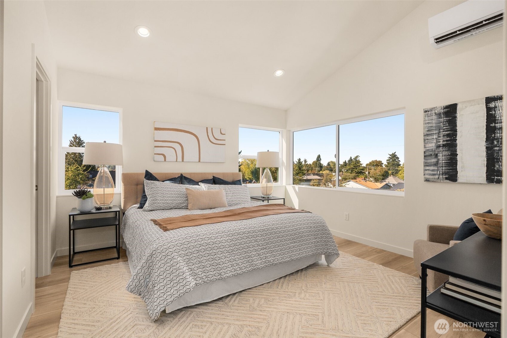 4853 South Findlay Street Seattle, WA 98118 - Photo 22 of 32 a bedroom with a large bed and a window