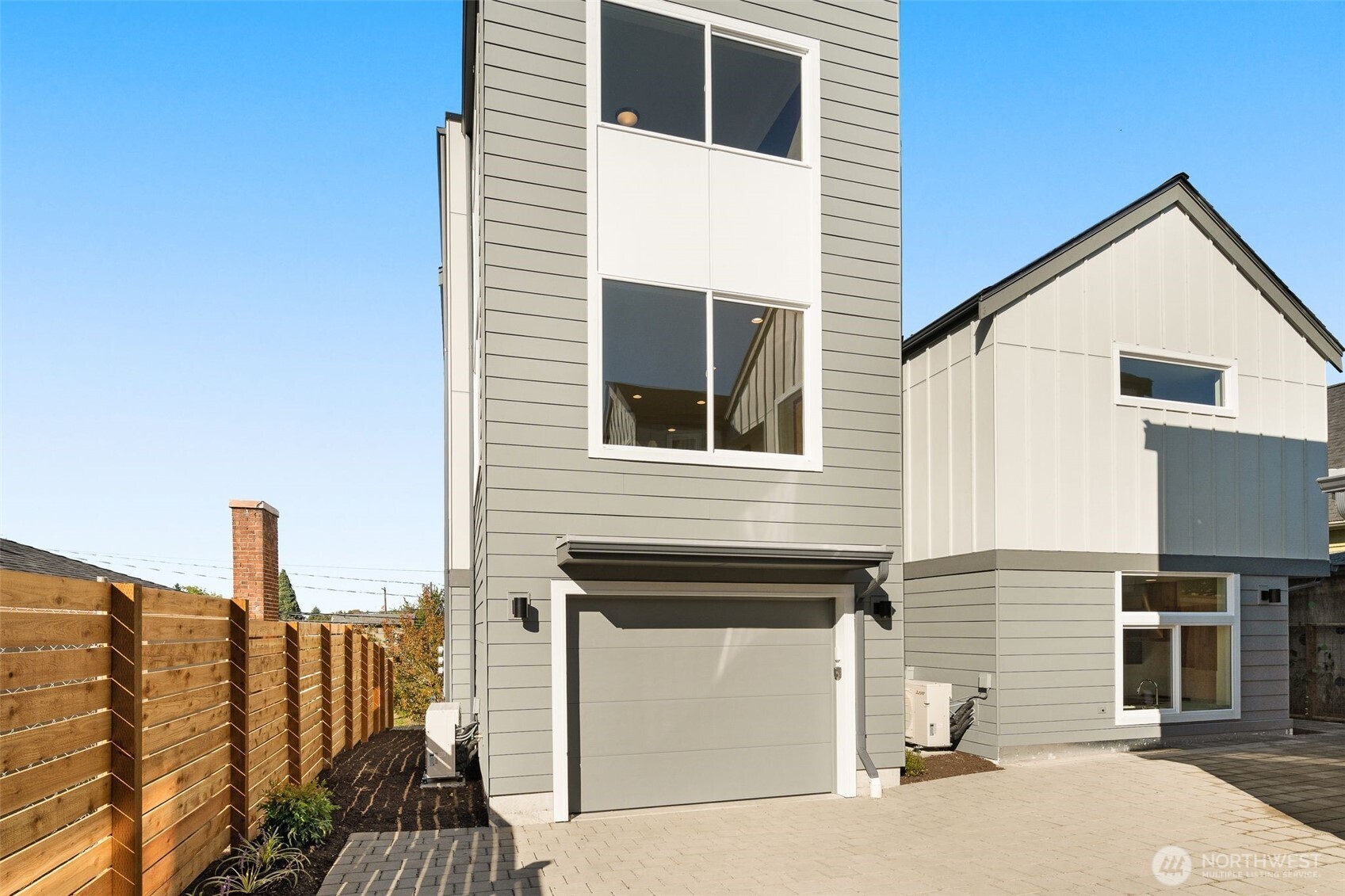 4853 South Findlay Street Seattle, WA 98118 - Photo 23 of 32 a view of a house with a balcony