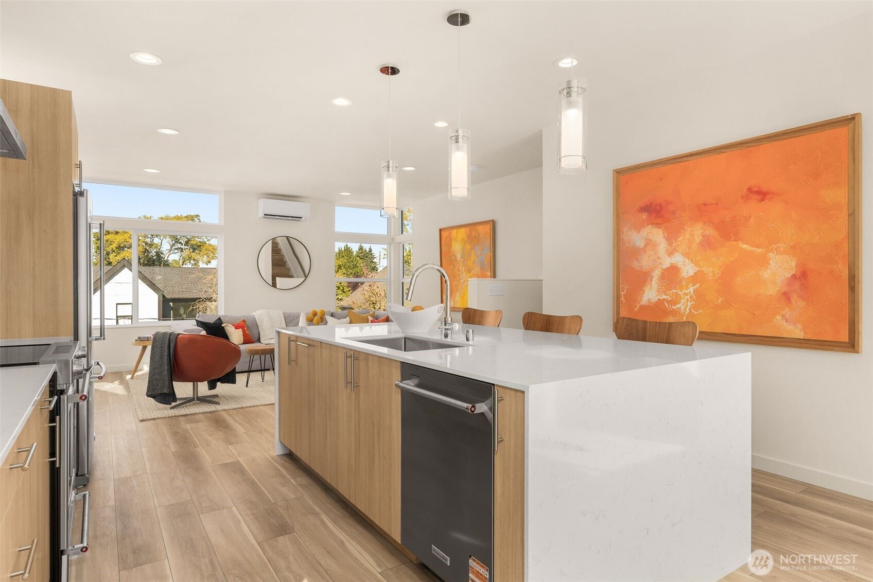 4853 South Findlay Street Seattle, WA 98118 - Photo 4 of 32 a kitchen with a sink a counter top space and stainless steel appliances