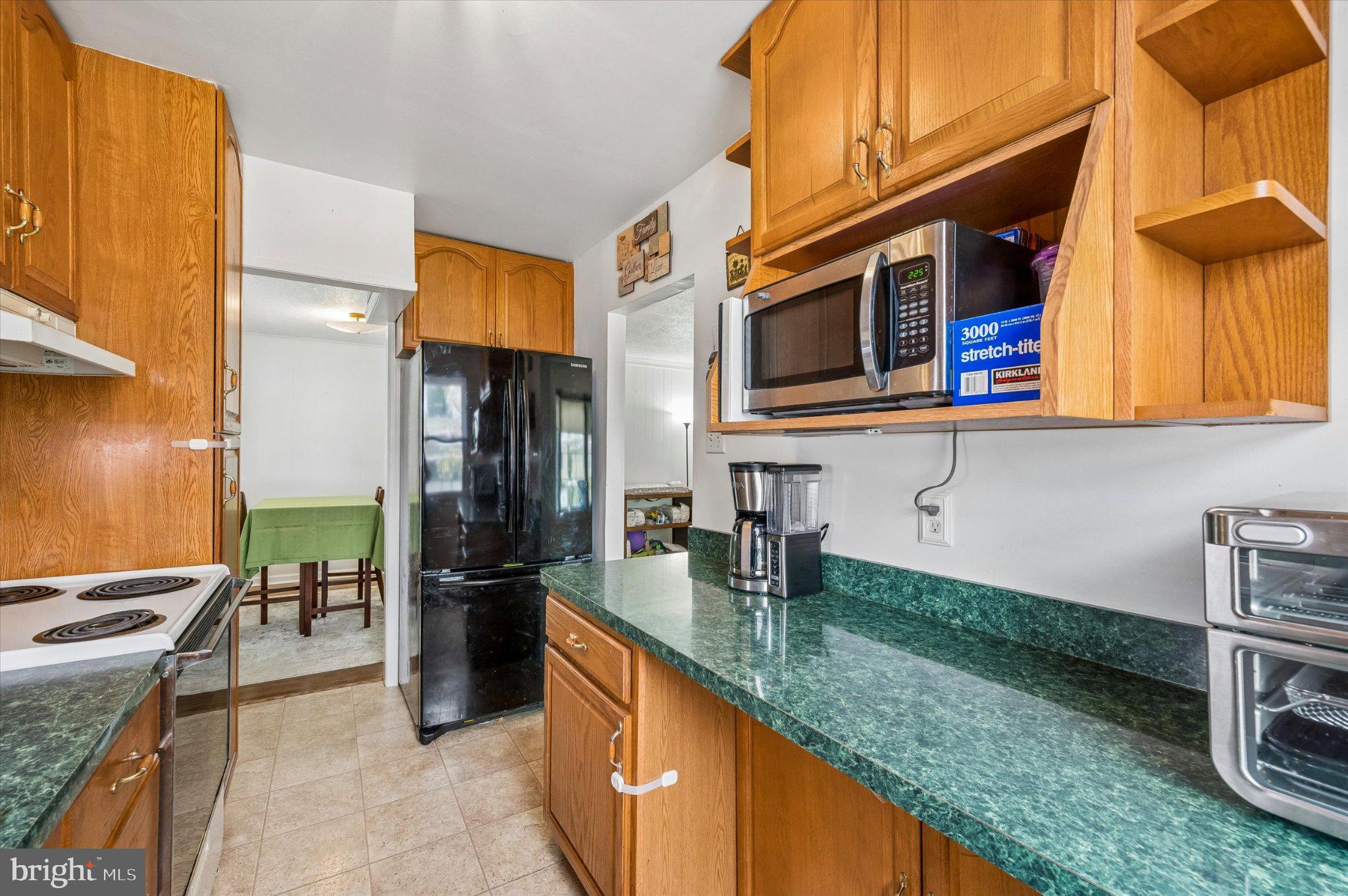 82 Hoffman Road Ridley Park, PA 19078 - Photo 11 of 25 Cozy kitchen with warm wood accents.