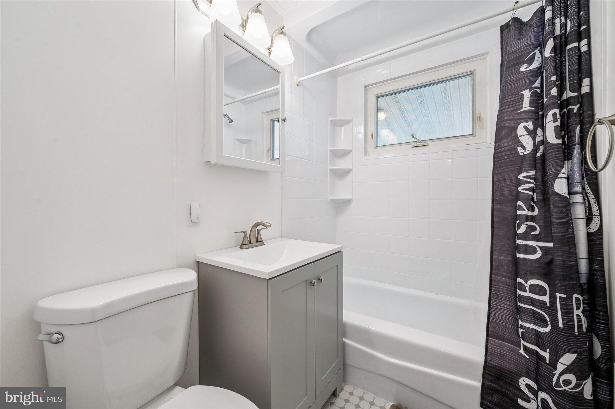82 Hoffman Road Ridley Park, PA 19078 - Photo 14 of 25 Modern bathroom with sleek finishes.