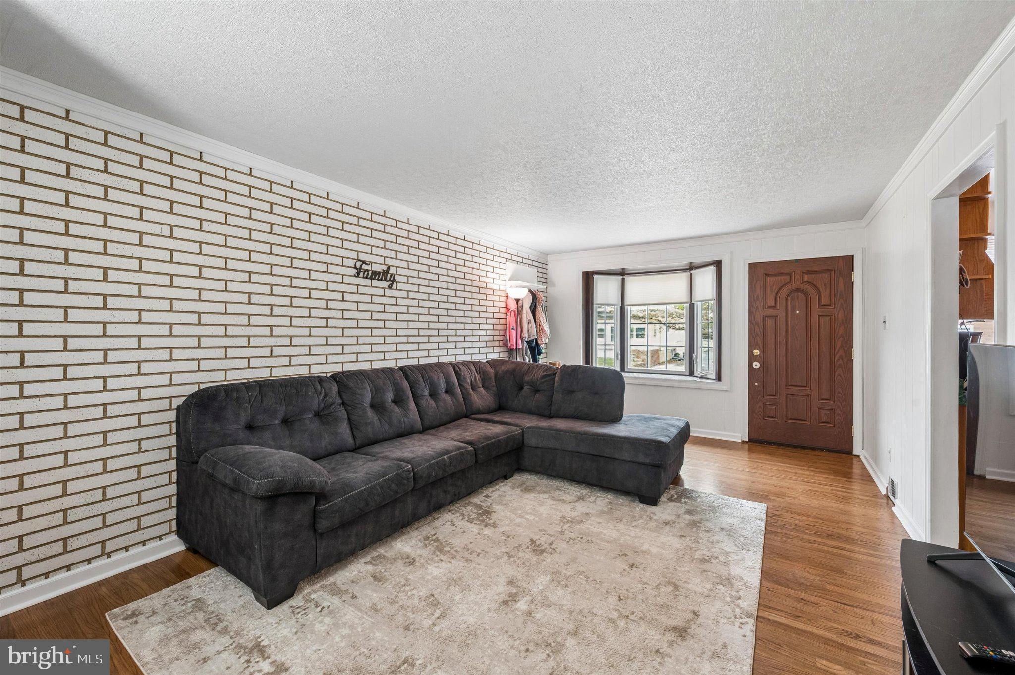 82 Hoffman Road Ridley Park, PA 19078 - Photo 4 of 25 Cozy living space with stylish accents.