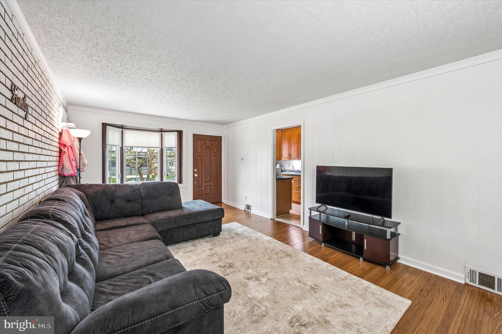 82 Hoffman Road Ridley Park, PA 19078 - Photo 5 of 25 Spacious living area with natural light.