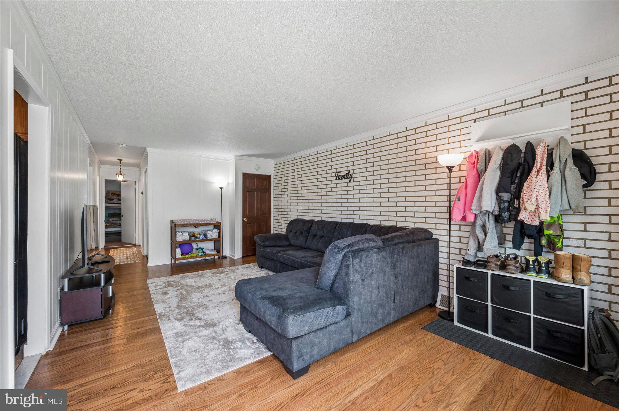 82 Hoffman Road Ridley Park, PA 19078 - Photo 6 of 25 Cozy living space with modern charm.