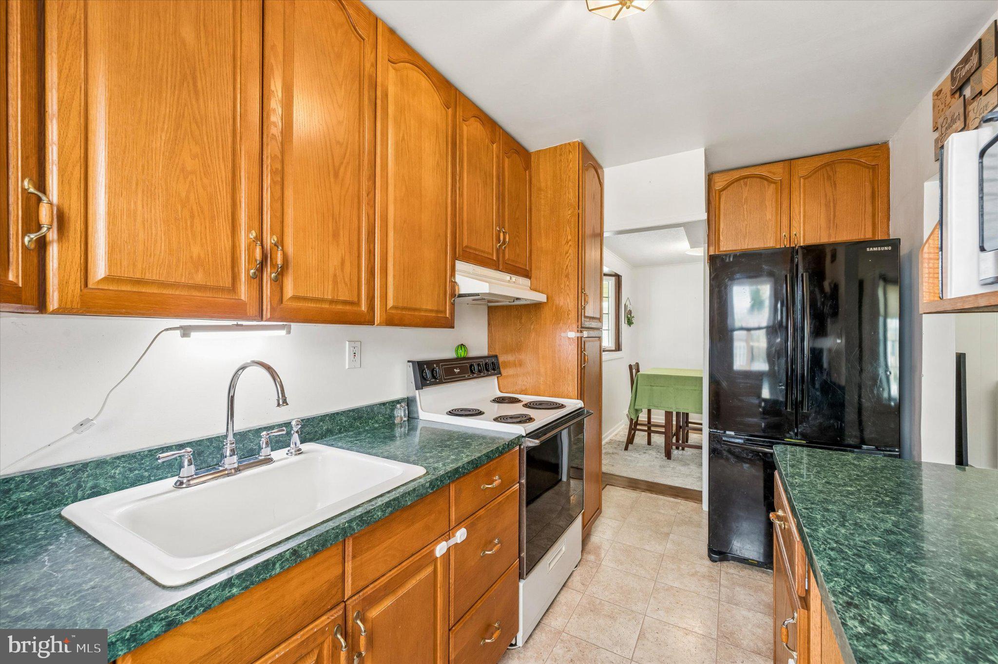 82 Hoffman Road Ridley Park, PA 19078 - Photo 10 of 25 Cozy kitchen with warm wood accents.