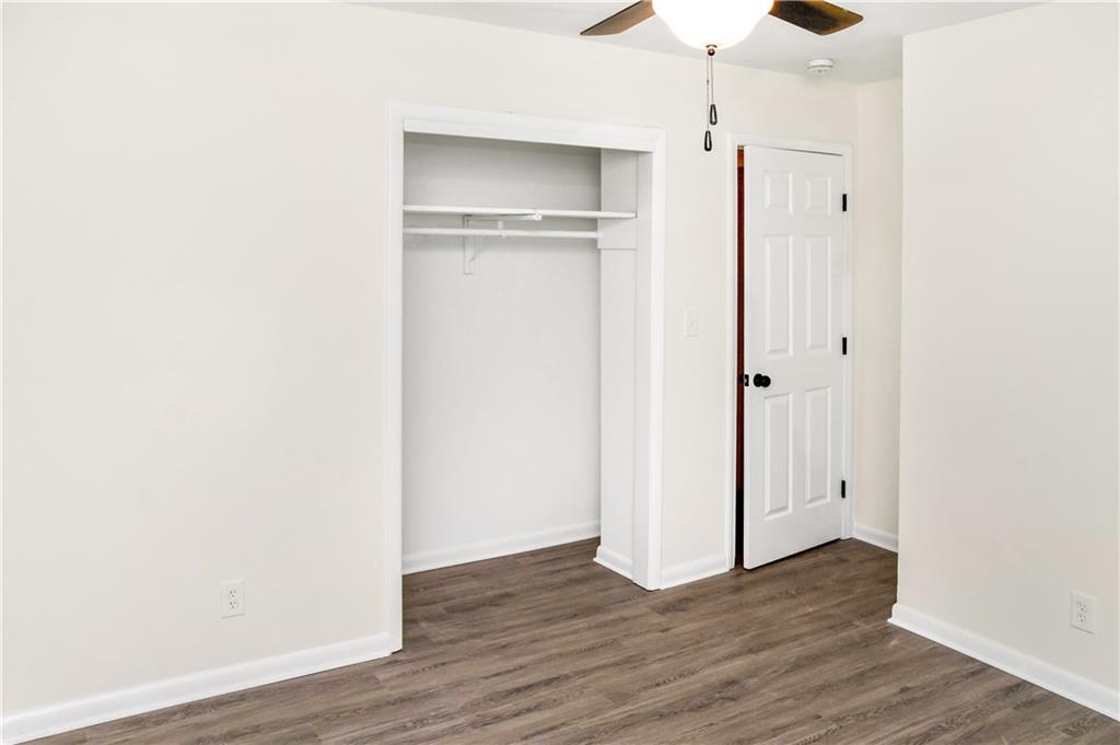 3530 Turner Heights Drive Decatur, GA 30032 - Photo 15 of 22 a view of an empty room with wooden floor