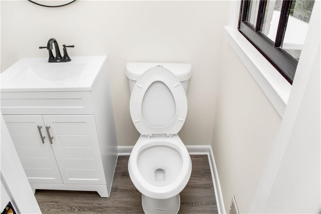 3530 Turner Heights Drive Decatur, GA 30032 - Photo 18 of 22 a bathroom with a toilet and a sink