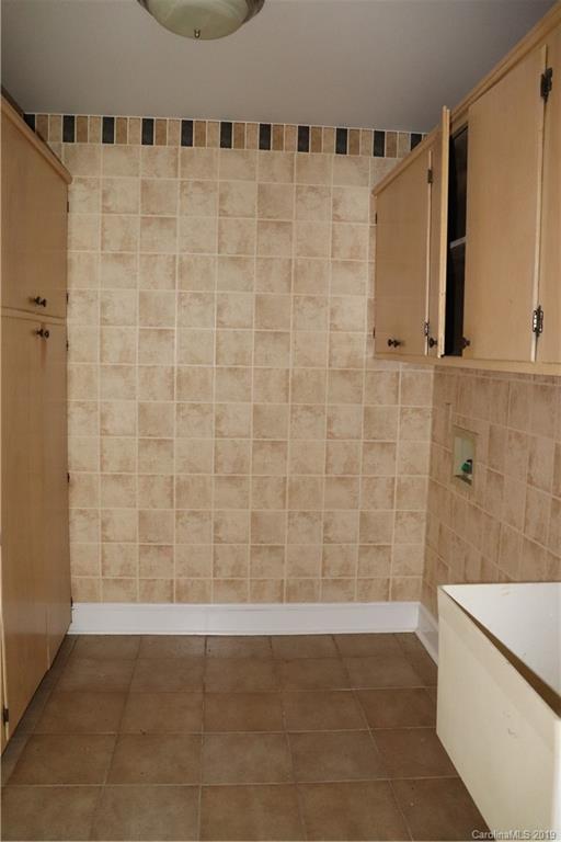 6520 Medlin Road Monroe, NC 28112 - Photo 14 of 22 a view of a bathroom with shower