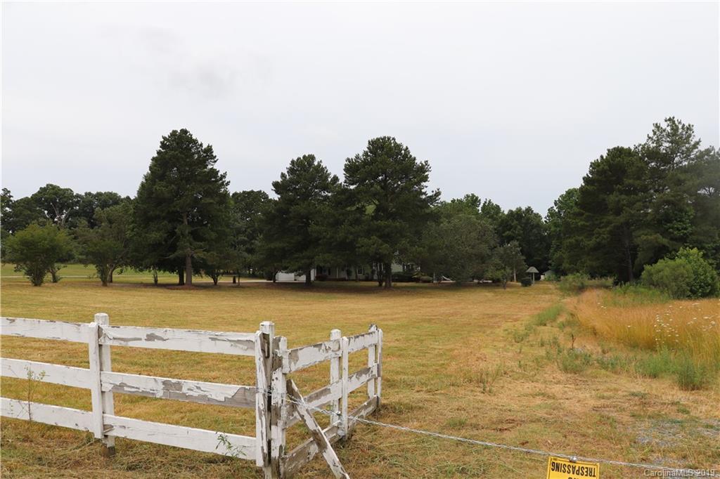 6520 Medlin Road Monroe, NC 28112 - Photo 5 of 22 a view of a swimming pool and an outdoor space