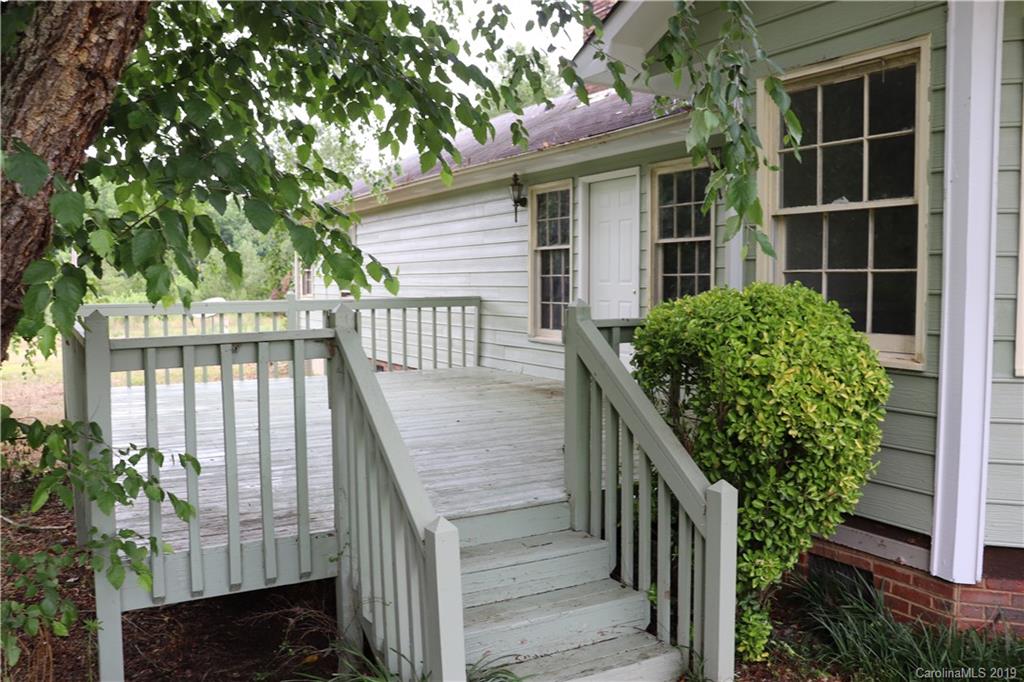 6520 Medlin Road Monroe, NC 28112 - Photo 8 of 22 a view of outdoor space and deck