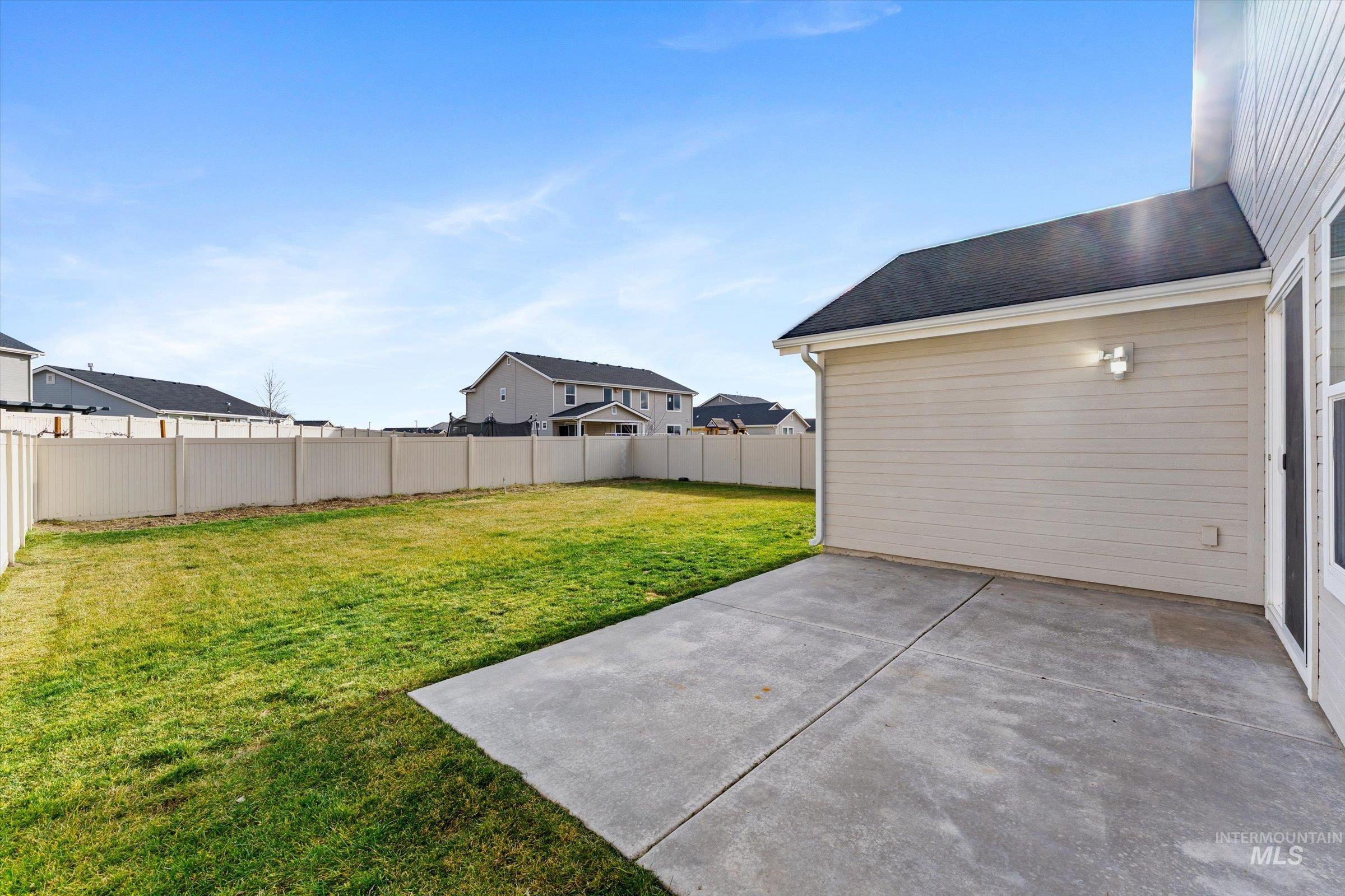 17798 Goose Ridge Avenue Nampa, ID 83687 - Photo 23 of 31 Fenced backyard featuring a patio area
