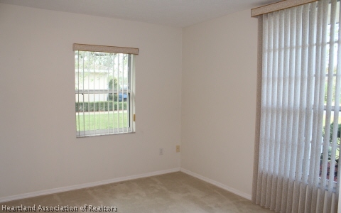 4570 Pebble Lane Sebring, FL 33872 - Photo 11 of 19 an empty room with a window