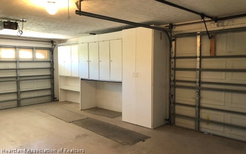 4570 Pebble Lane Sebring, FL 33872 - Photo 12 of 19 a view of walk in closet with empty racks