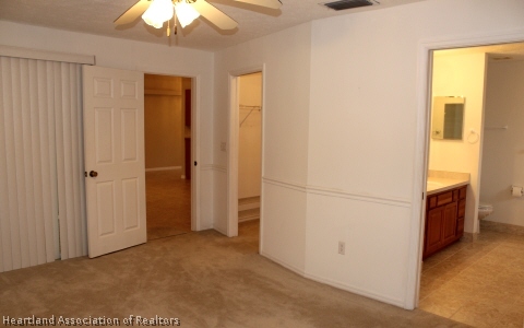4570 Pebble Lane Sebring, FL 33872 - Photo 14 of 19 a view of a livingroom with washer and dryer