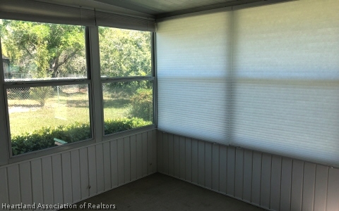 4570 Pebble Lane Sebring, FL 33872 - Photo 15 of 19 a view of a balcony from a window