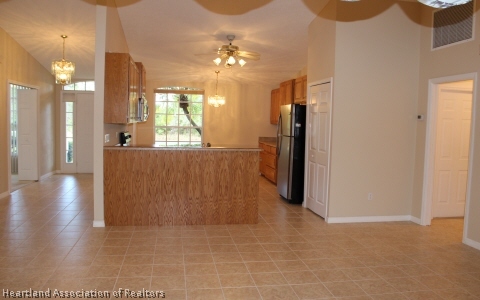 4570 Pebble Lane Sebring, FL 33872 - Photo 18 of 19 a view of a hallway with interior of the house