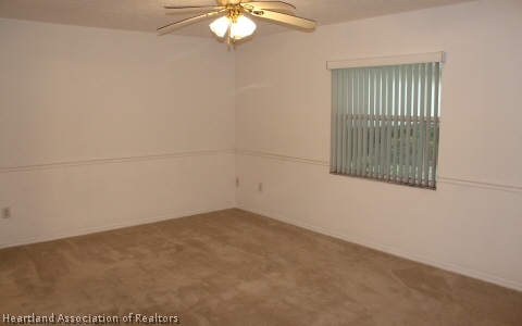 4570 Pebble Lane Sebring, FL 33872 - Photo 6 of 19 an empty room with a window