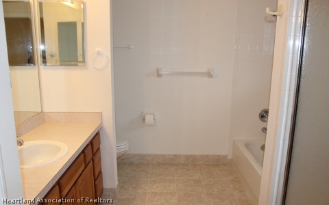 4570 Pebble Lane Sebring, FL 33872 - Photo 7 of 19 a bathroom with a granite countertop sink