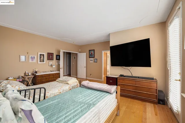 a view of storage and utility room with washer and dryer
