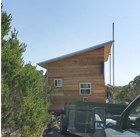 a view of a house with a patio