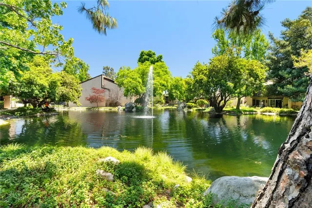 a view of a lake with a house