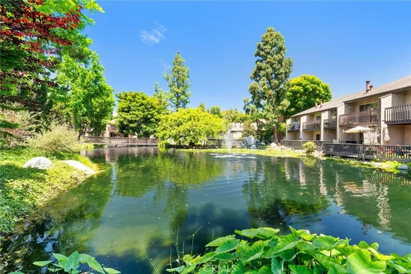 a view of a garden with a fountain