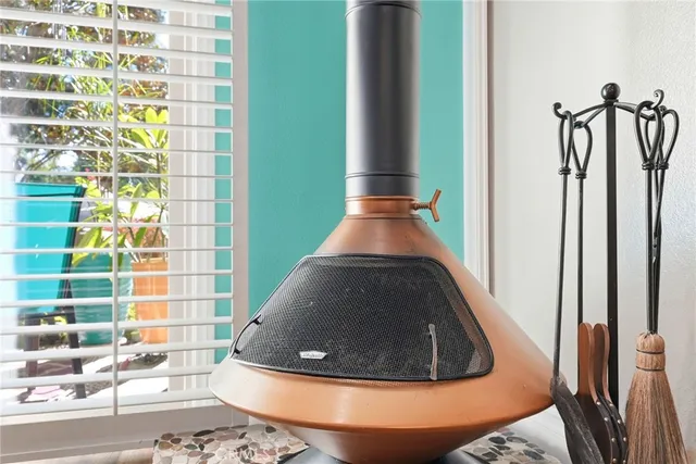 a view of a livingroom with furniture and staircase