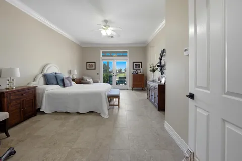 a bathroom with a granite countertop toilet sink and shower