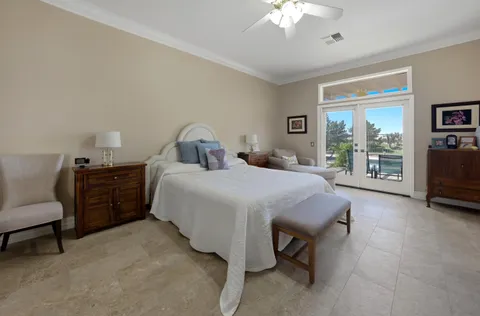 a view of a kitchen with a stove and wooden floor