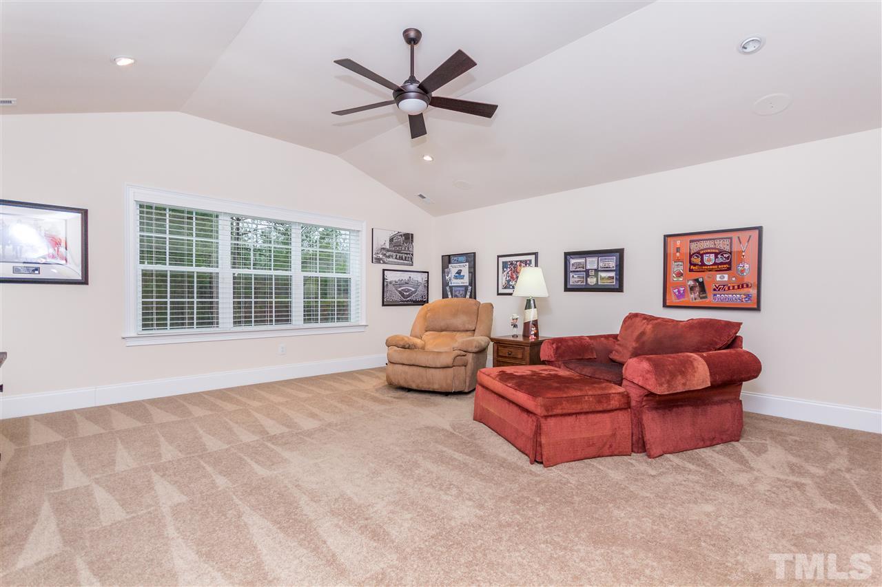 4600 Fielding Drive Raleigh, NC 27606 - Photo 17 of 25 a living room with furniture and a large window
