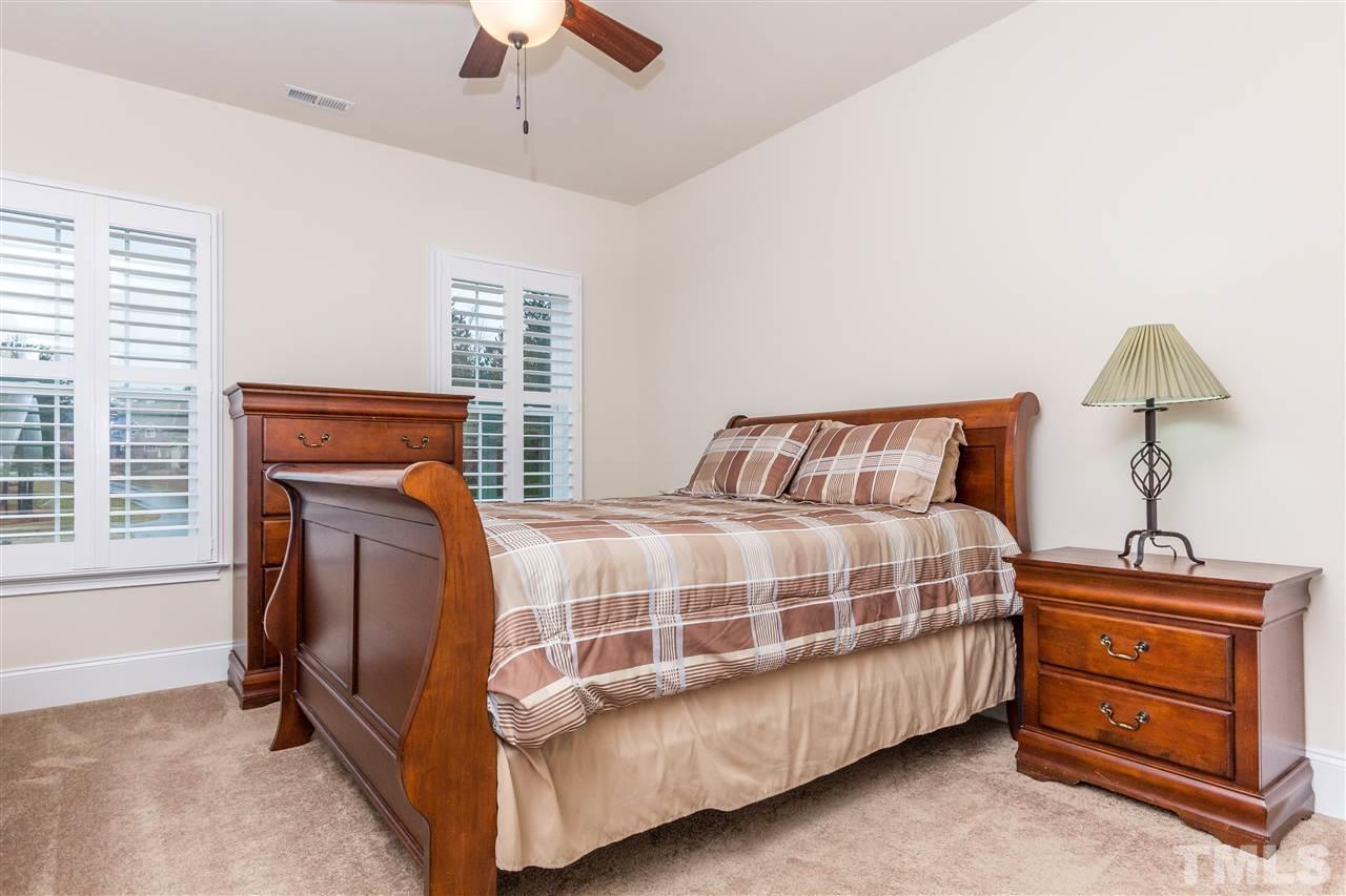 4600 Fielding Drive Raleigh, NC 27606 - Photo 18 of 25 a bedroom with a bed and a window